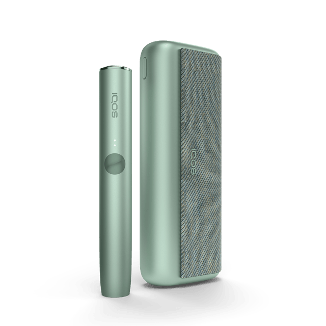 A jade green IQOS ILUMA PRIME device and holder.